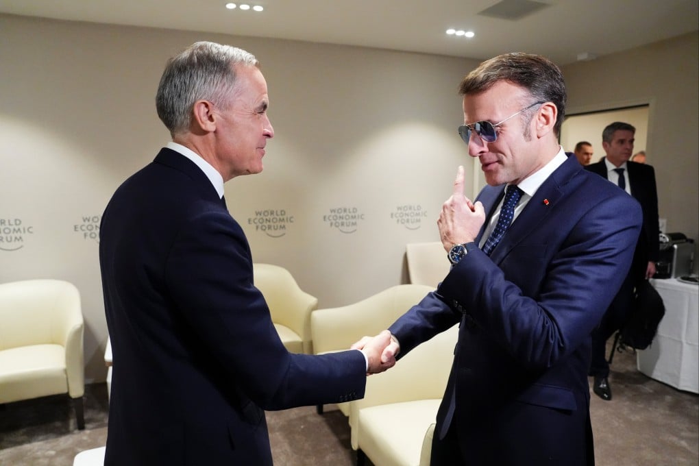 French President Emmanuel Macron and Canadian Prime Minister Mark Carney shake hands at a meeting of the World Economic Forum in Davos, Switzerland, on January 20. Photo: AP