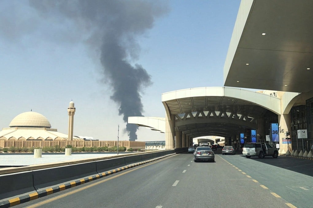 Large plume of black smoke rises from the fuel storage area at King Khalid International Airport in Riyadh, Saudi Arabia, on Saturday. Photo: Reuters