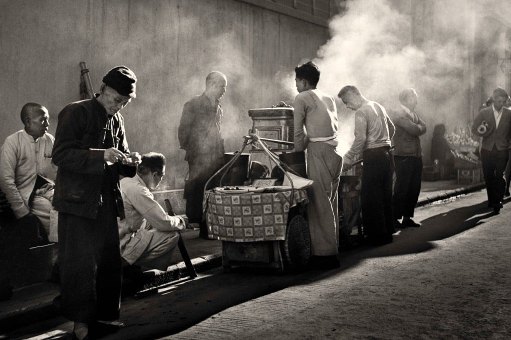 Coolies and Hawkers (1958) by Fan Ho. The late photographer’s evocative Hong Kong street photography is being showcased at the Palazzo Falletti di Barolo in Turin, Italy. Photo: Fan Ho Trust and Estate, courtesy of Blue Lotus Gallery