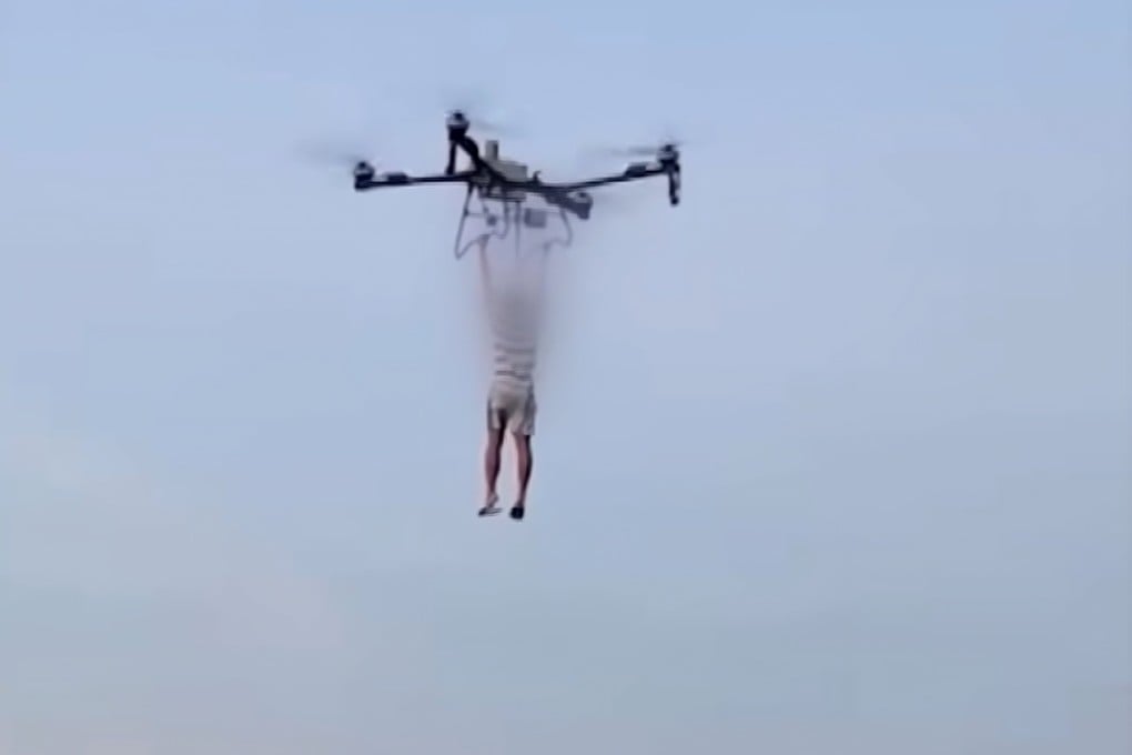 A person dangles from a drone in this still from footage obtained by Korean broadcaster JTBC allegedly showing a practice run for Park Wang-yeol’s escape. Photo: YouTube/JTBC_News