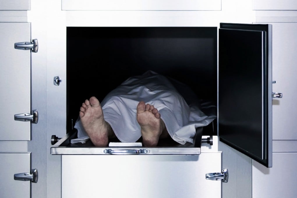The photo above shows a deceased individual inside a refrigerated mortuary compartment. A family in China was left stunned when a female relative in her 70s woke up inside her coffin. Photo: Shutterstock