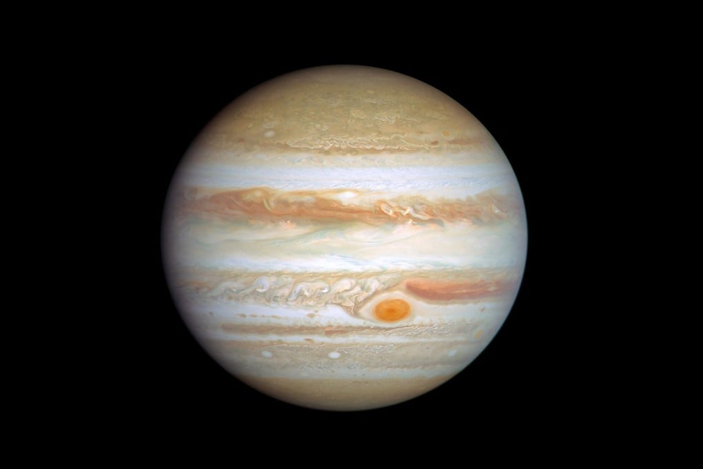 Jupiter can be up to 900 million km from Earth, with radio signals taking more than 50 minutes to travel one way. Photo: Nasa/STSCI