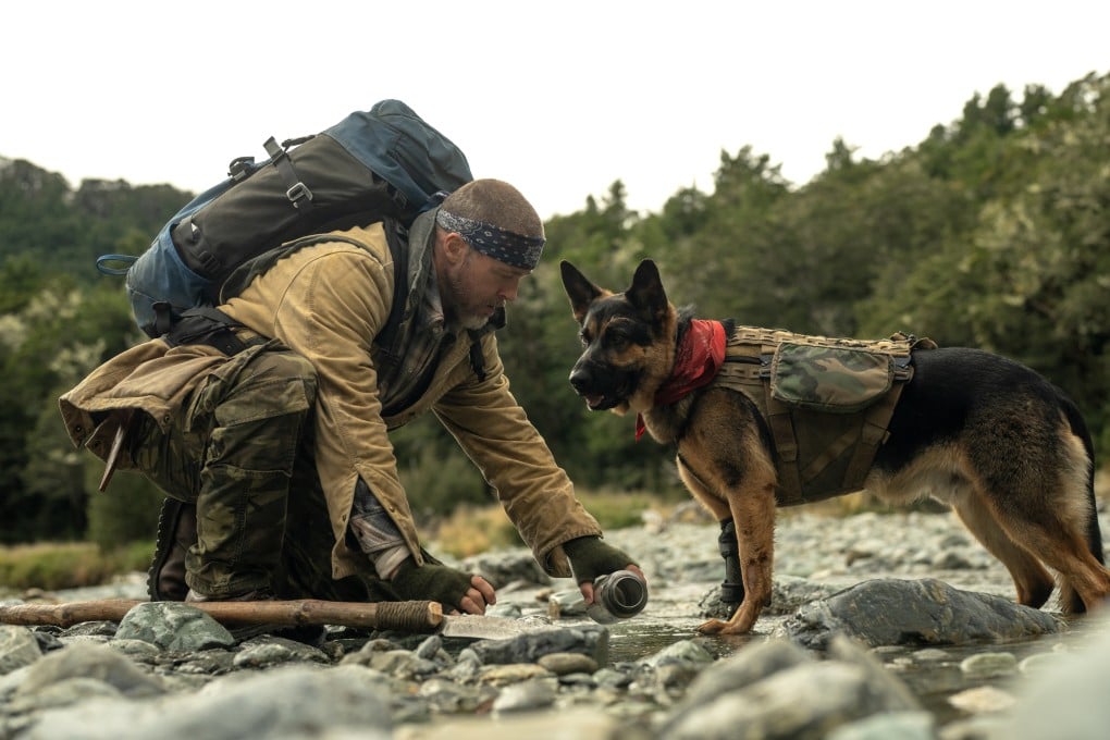 Brad Pitt as ex-special forces soldier James Belmont and Uber as ex-combat dog Odin in a still from Heart of the Beast (category IIA), directed by David Ayer. Photo: Paramount Pictures