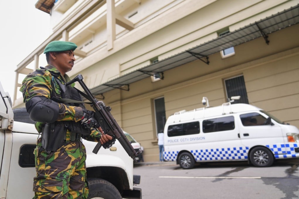 A police commando stands guard at the High Court in Colombo, Sri Lanka, on Tuesday, ahead of a verdict related to the 2019 Easter bombings. Photo: AP