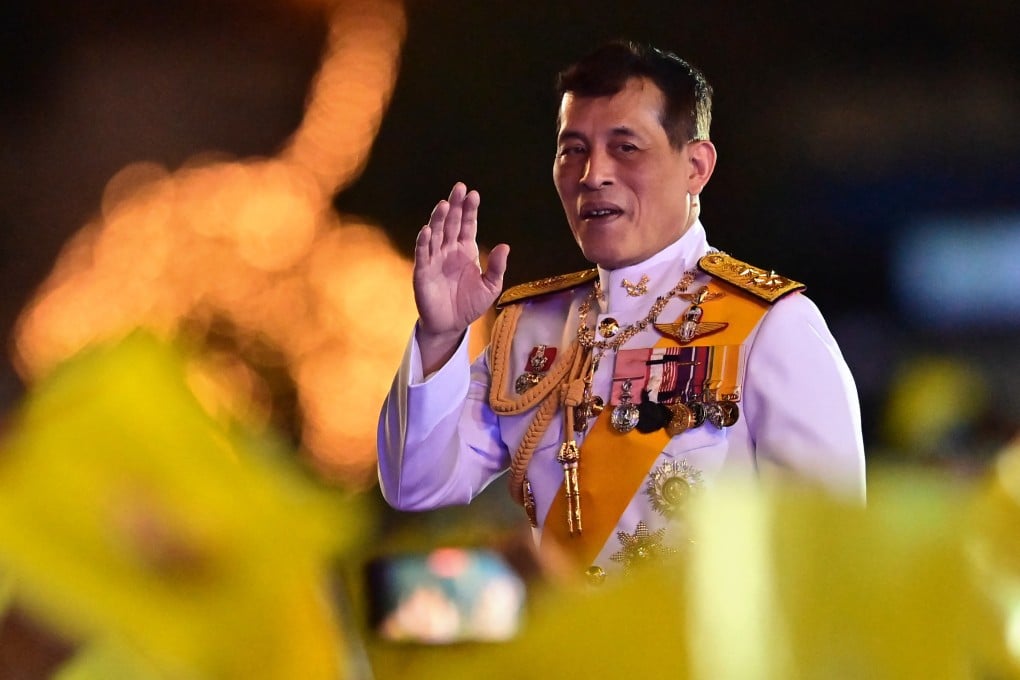 Thailand's King Maha Vajiralongkorn waves to royalist supporters during a ceremony to commemorate the birthday of the late Thai king Bhumibol Adulyadej at Sanam Luang in Bangkok in December 2020. Photo: AFP