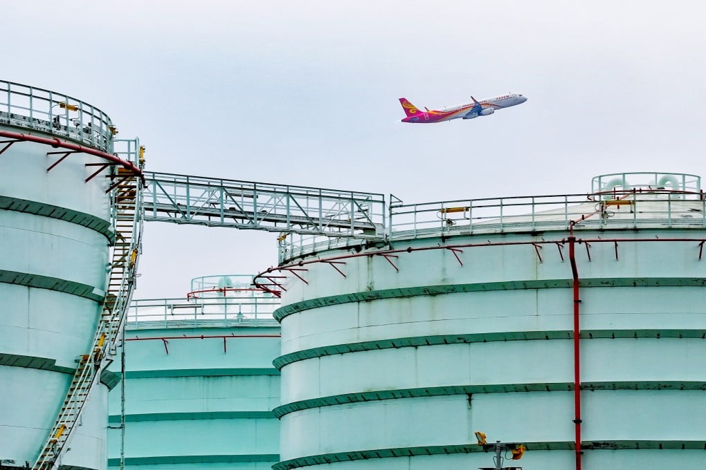 The city’s policy chief Stephen Wong says Hong Kong needs sustainable aviation fuel targets to attract investment, secure supplies and retain its aviation hub status. Photo: Elson Li