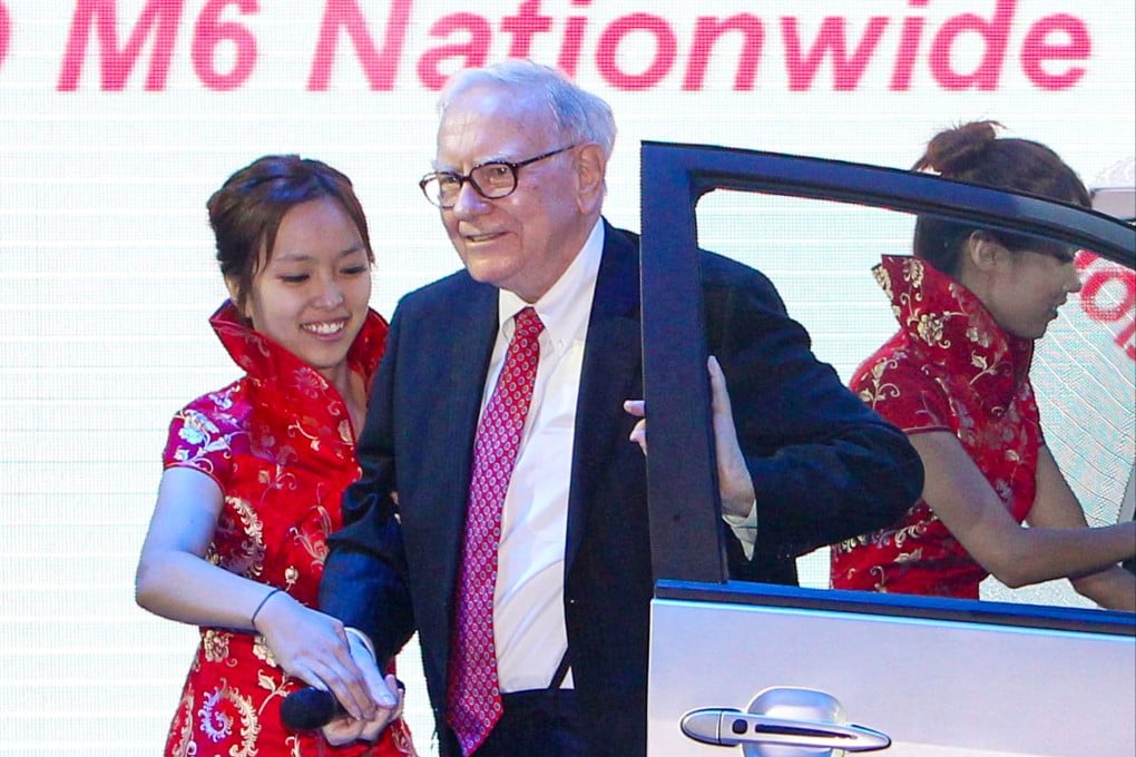 In this 2010 image, Warren Buffett is seen at a BYD product-launch conference in Beijing, two years after the company he founded, Berkshire Hathaway, invested in the Chinese automaker. Photo: Getty Images