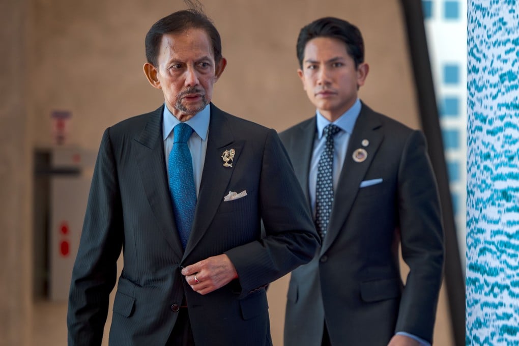Brunei Sultan Hassanal Bolkiah (left) and son Prince Abdul Mateen arrive for the Asean Summit welcome ceremony in Cebu, Philippines, on May 8. Photo: EPA