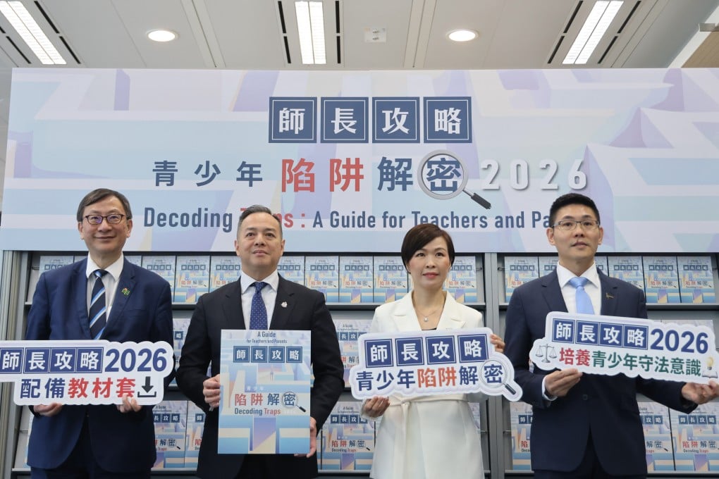 (From left) Professor John Lee, president of Education University; police chief Joe Chow; Senior Superintendent Ng Chui-ting of police’s public relations wing; and Chan Man-ho, deputy executive director of the Hong Kong Federation of Youth Groups. Photo: Nora Tam