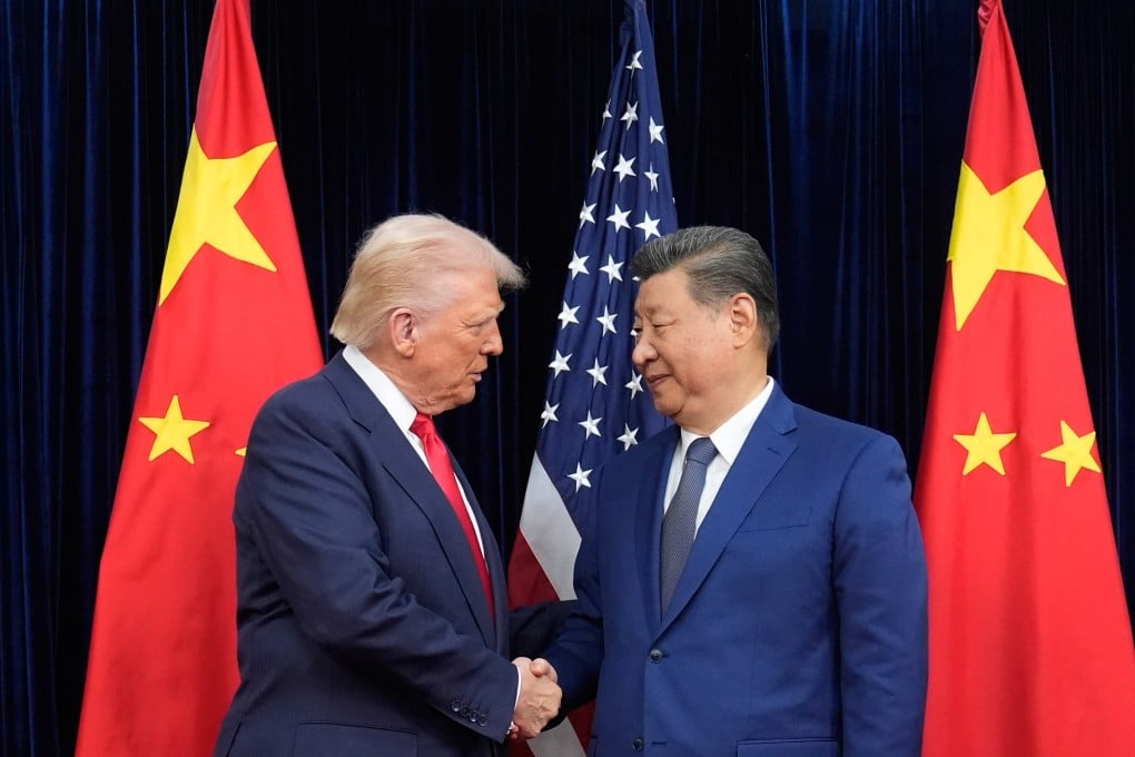 President Donald Trump and President Xi Jinping shake hands before their meeting at Gimhae International Airport in Busan, South Korea, on October 30 last year. Photo: AP