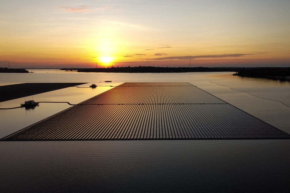 The sun sets on floating solar panels for the Sirindhorn Dam hydro-solar farm run by the Electricity Generating Authority of Thailand in Ubon Ratchathani in February 2022. Photo: AFP