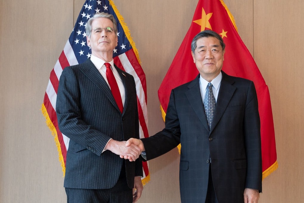 Scott Bessent and He Lifeng shake hands ahead of their talks on Sunday in Washington. Photo: Xinhua