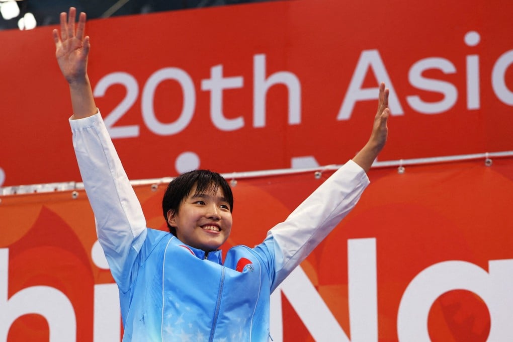 China’s Zidi Yu celebrates on the podium after winning the 400m individual medley final in Tokyo on Wednesday. Photo: Reuters