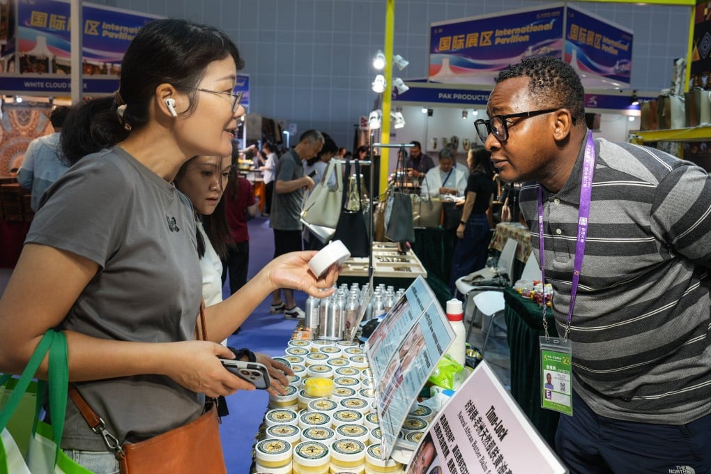 An exhibitor chats to visitors at the 23rd China-Asean Expo in Nanning, Guangxi Zhuang Autonomous Region, on September 21. Bilateral trade exceeded US$1 trillion in 2025. Photo: Xinhua
