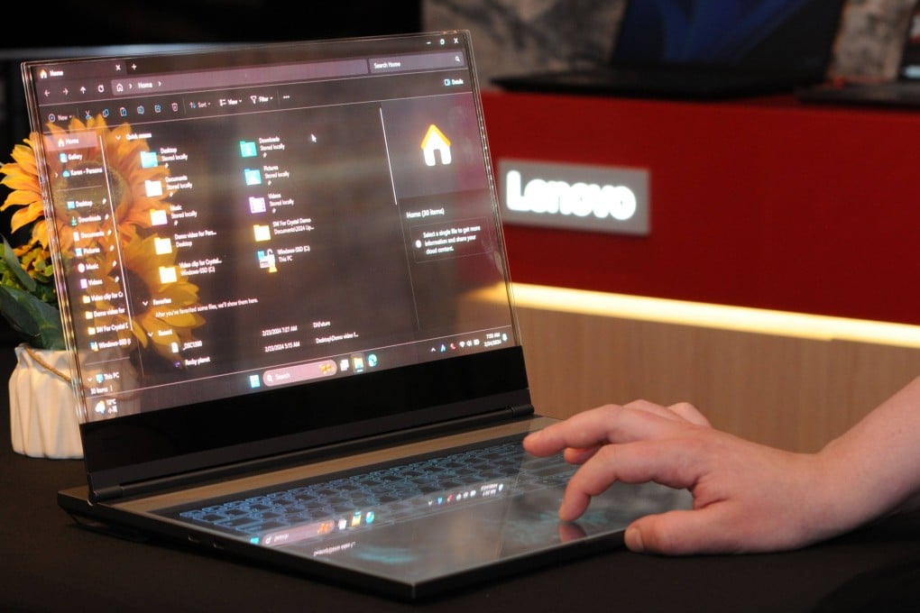 A Lenovo laptop with a transparent screen is displayed at the Mobile World Congress in Spain. Photo: dpa