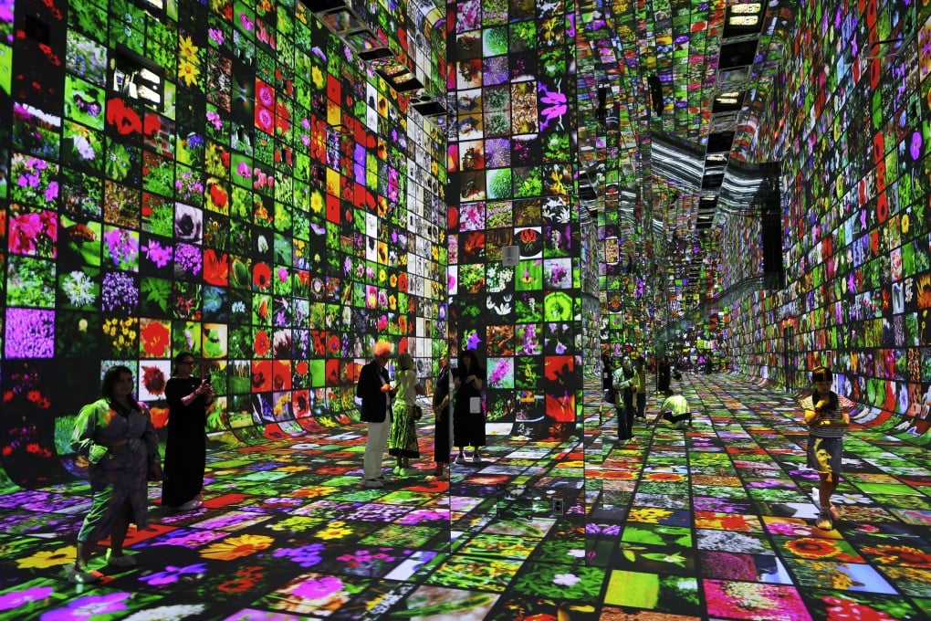 Visitors tour Dataland, the world’s first museum of AI arts, on June 16 in Los Angeles. Photo: Getty Images