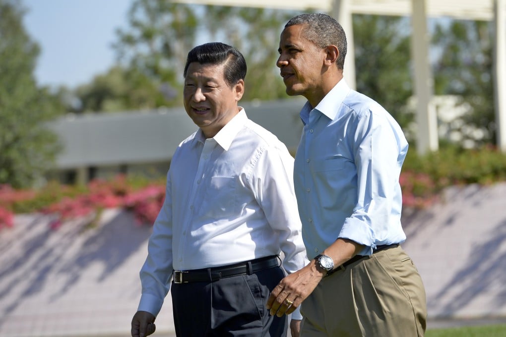 Chinese President Xi Jinping (left) and then US president Barack Obama chat as they take a walk at the Annenberg Retreat at Sunnylands in Rancho Mirage, California, on June 8, 2013. Photo: AFP