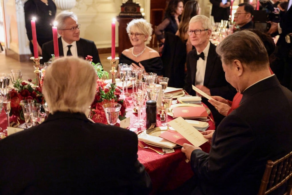 US President Donald Trump and Chinese President Xi Jinping sit together during a state dinner at the White House on Thursday. Photo: Reuters