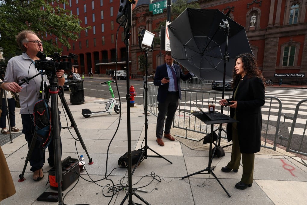 US White House correspondent Laura Barron-Lopez reports for MS Now near the White House, after reporters from CNN, Politico and MS Now were barred from the White House on Thursday despite a judge’s order calling for access to be restored immediately. Photo: Reuters