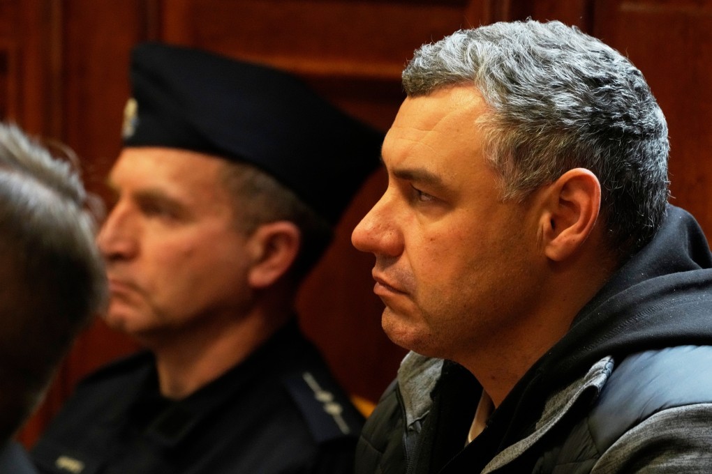 Ukrainian defendant Volodymyr Zhuravlov (right) at Warsaw’s Regional Court in Warsaw, Poland in October last year. Photo: AP