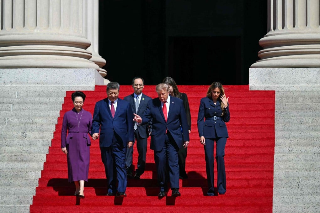 US President Donald Trump, First Lady Melania Trump, China’s President Xi Jinping and his wife, Peng Liyuan, walk down the steps after a visit to the National Archives in Washington, DC on Saturday. Photo: AFP