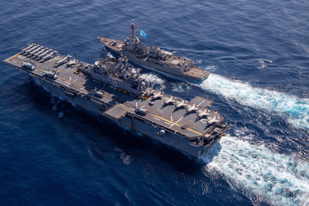 The USS Makin Island and USS Chung-Hoon conduct replenishment-at-sea operations in the South China Sea. Photo: US Navy