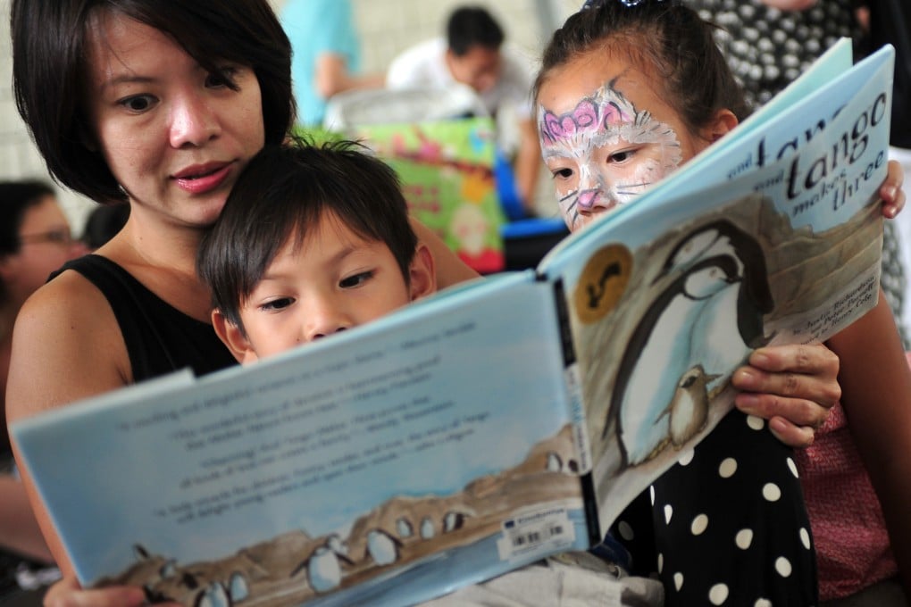 Children take part in a reading event outside the National Library in Singapore 2014. Photo: Xinhua