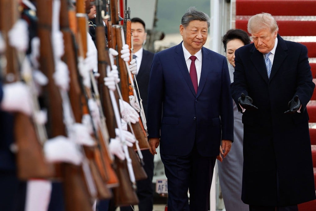 US President Donald Trump walks on the red carpet after greeting Chinese President Xi Jinping and his wife, Peng Liyuan, at Joint Base Andrews, in the US state of Maryland on September 23. Photo: Getty Images via AFP