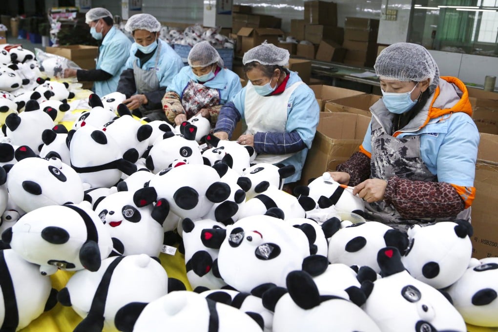 Workers produce Bing Dwen Dwen merchandise at a toy factory in Jinjiang, southeast China’s Fujian Province. Photo: Xinhua