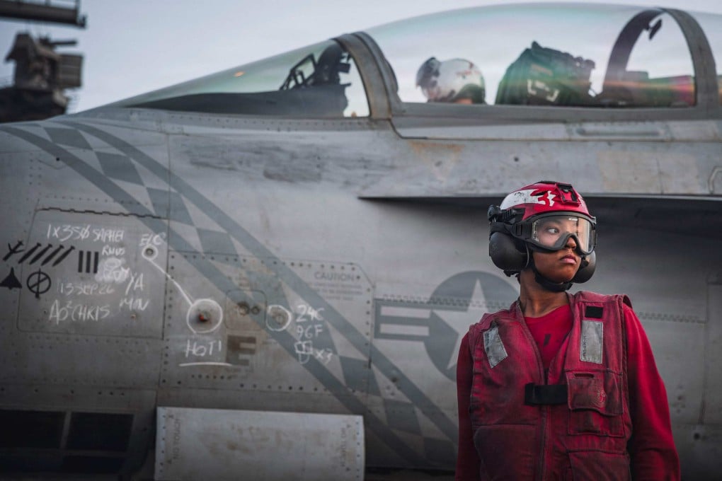 An F/A-18 Super Hornet on the flight deck of the USS George Washington. Photo: US Navy via AFP