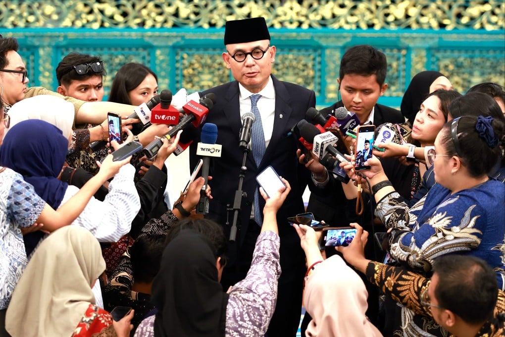 Indonesia’s newly appointed Foreign Minister Arrmanatha Nasir speaks to the media during a press conference following his inauguration ceremony at the presidential palace in Jakarta on Thursday. Photo: EPA