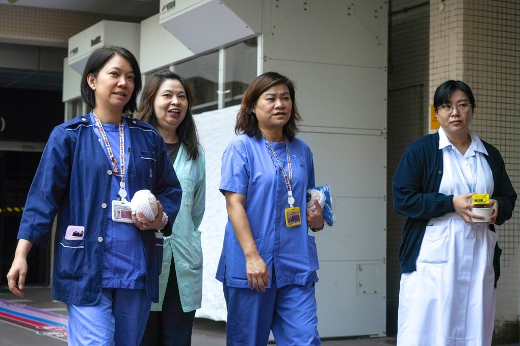 Nurses outside Queen Elizabeth Hospital in Yau Ma Tei. Photo: Sun Yeung