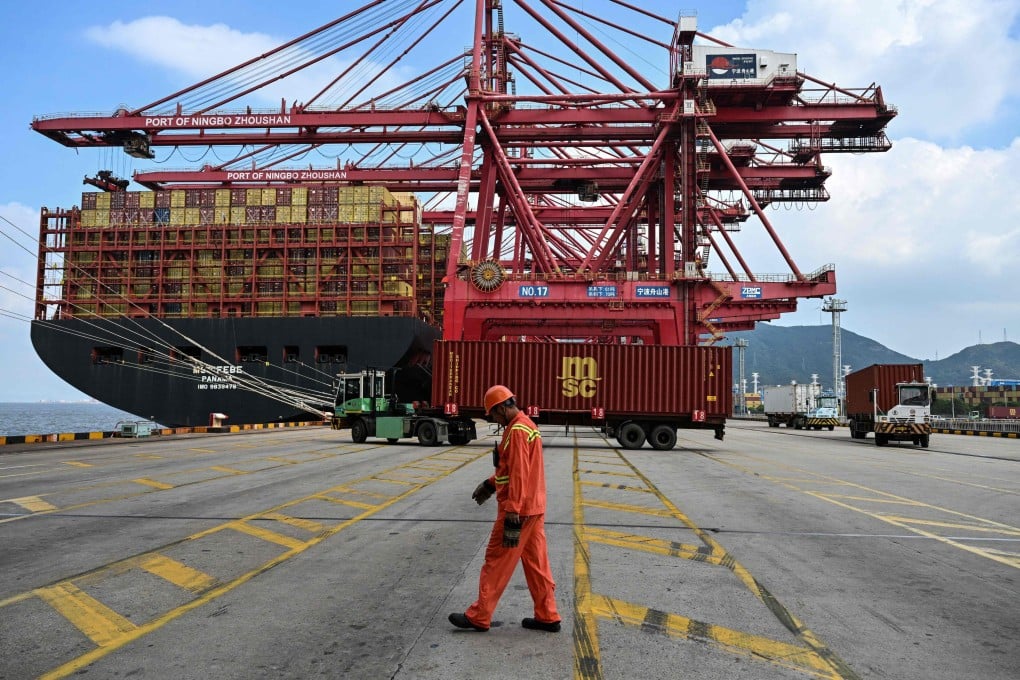 Cranes load containers onto a ship at the Port of Ningbo-Zhoushan in Ningbo, China’s eastern Zhejiang province, on September 22. Photo: AFP