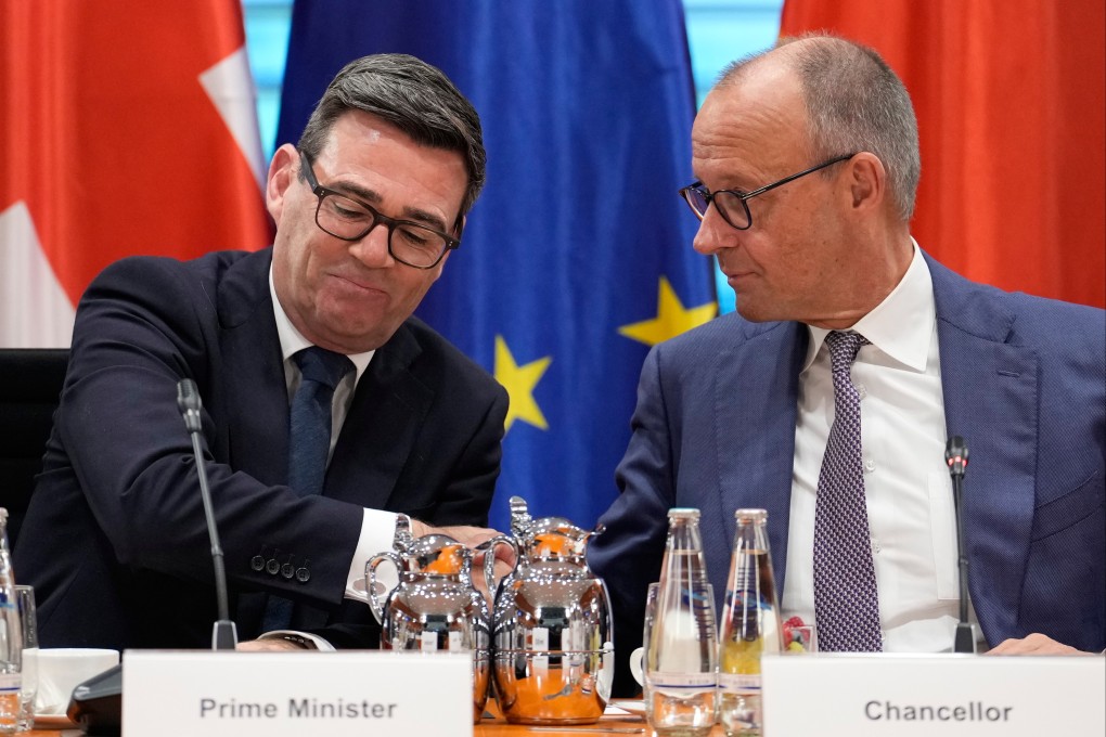 British Prime Minister Andy Burnham (left) and German Chancellor Friedrich Merz during a regional growth forum in Berlin on Thursday. Photo: AP