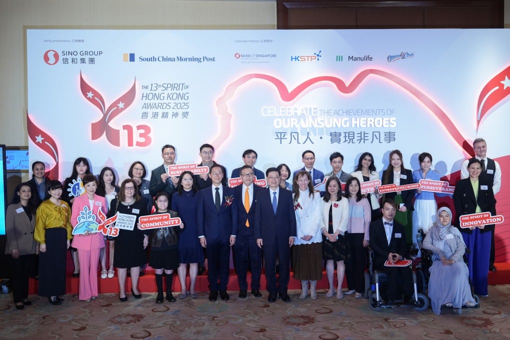 Chief Executive John Lee (centre), organisers and finalists at the last Spirit of Hong Kong Awards ceremony, held in February this year. Photo: Eugene Lee