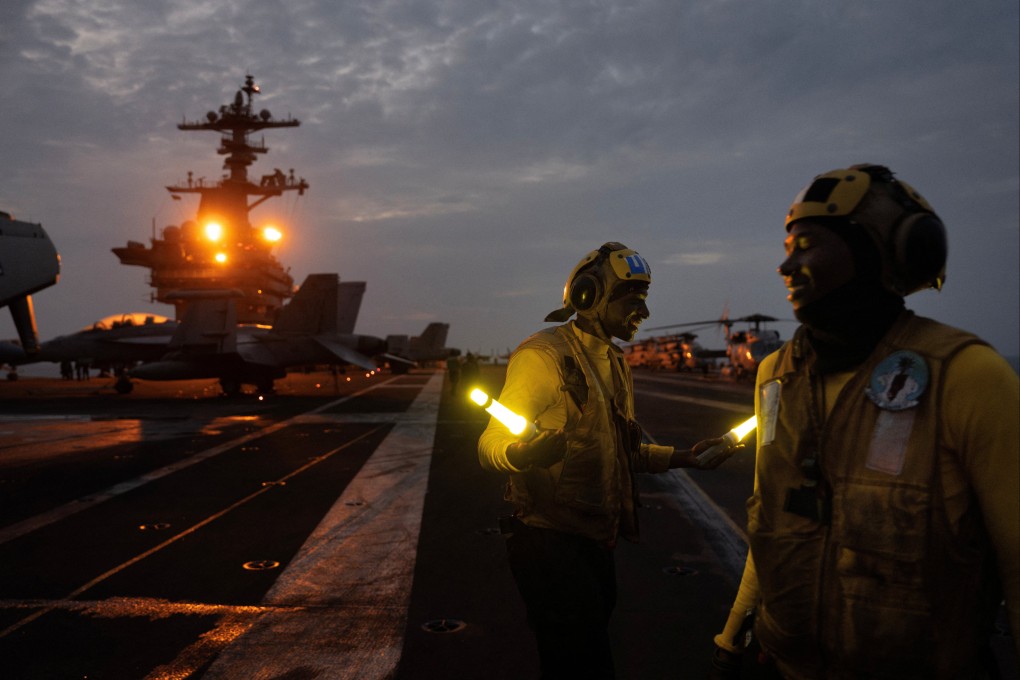 The deployment of the USS George Washington to the Middle East was among moves Mark Montgomery says the effects of moving carriers from the Indo-Pacific may last until 2030. Photo: Reuters