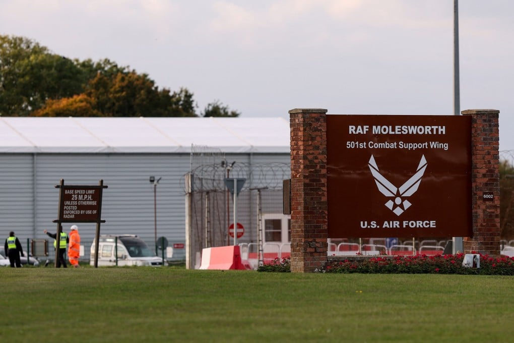 A sign at the entrance of RAF Molesworth in Cambridgeshire, Britain. Two Latvian nationals were arrested near the base on Thursday. Photo: Reuters
