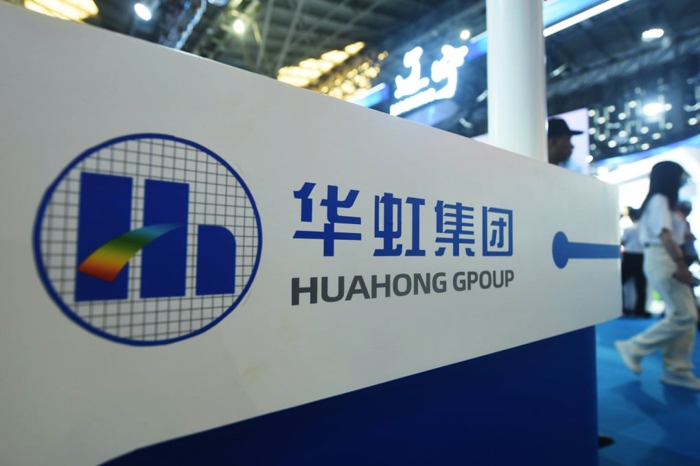 People visit the stand of Hua Hong at an exhibition in Shanghai. Photo: Getty Images