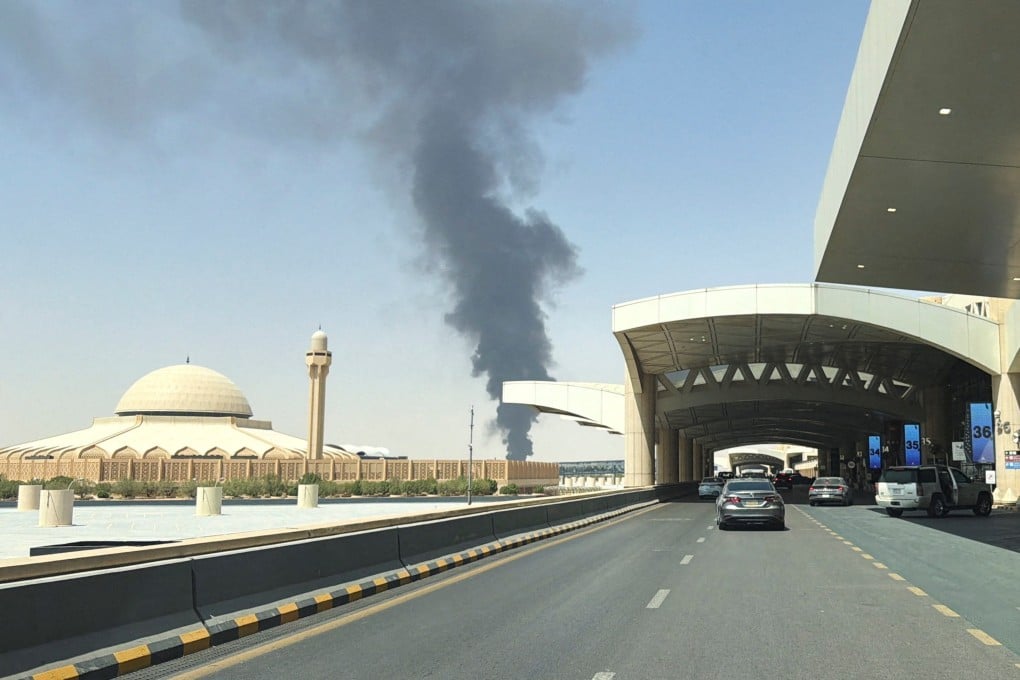 Large plume of black smoke rises from the fuel storage depot at King Khalid International Airport, in Riyadh, Saudi Arabia, on September 19. Photo: Reuters