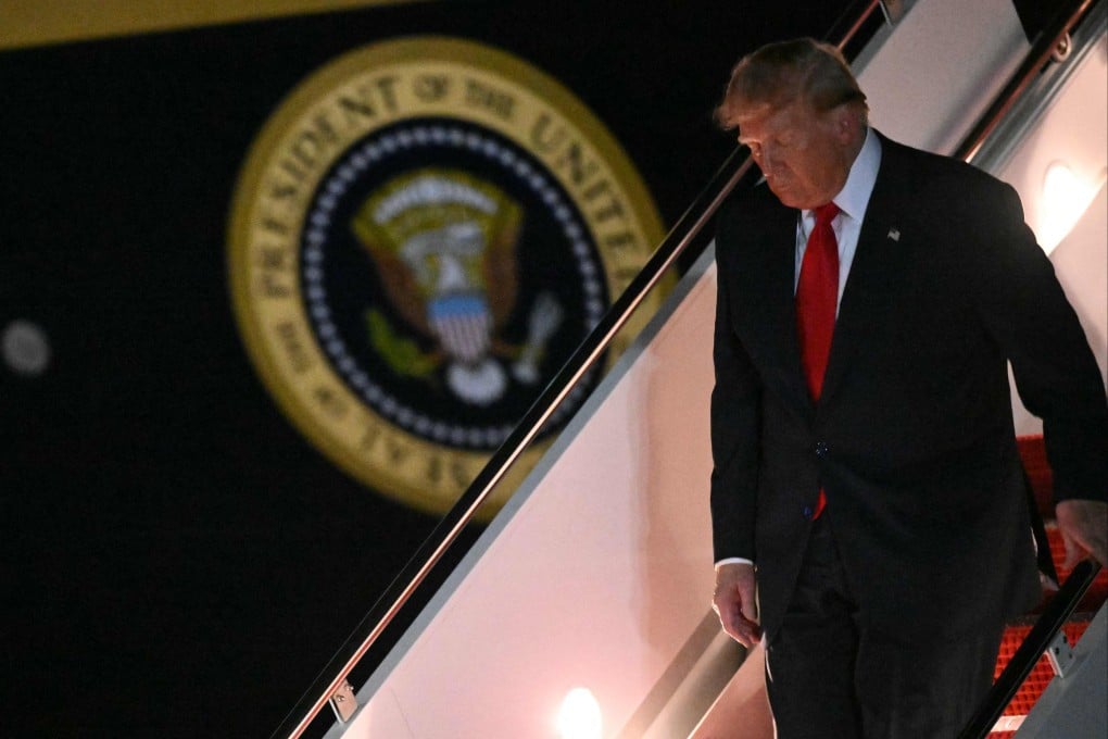 US President Donald Trump steps off Air Force One at Joint Base Andrews, Maryland, on Friday. Photo: AFP