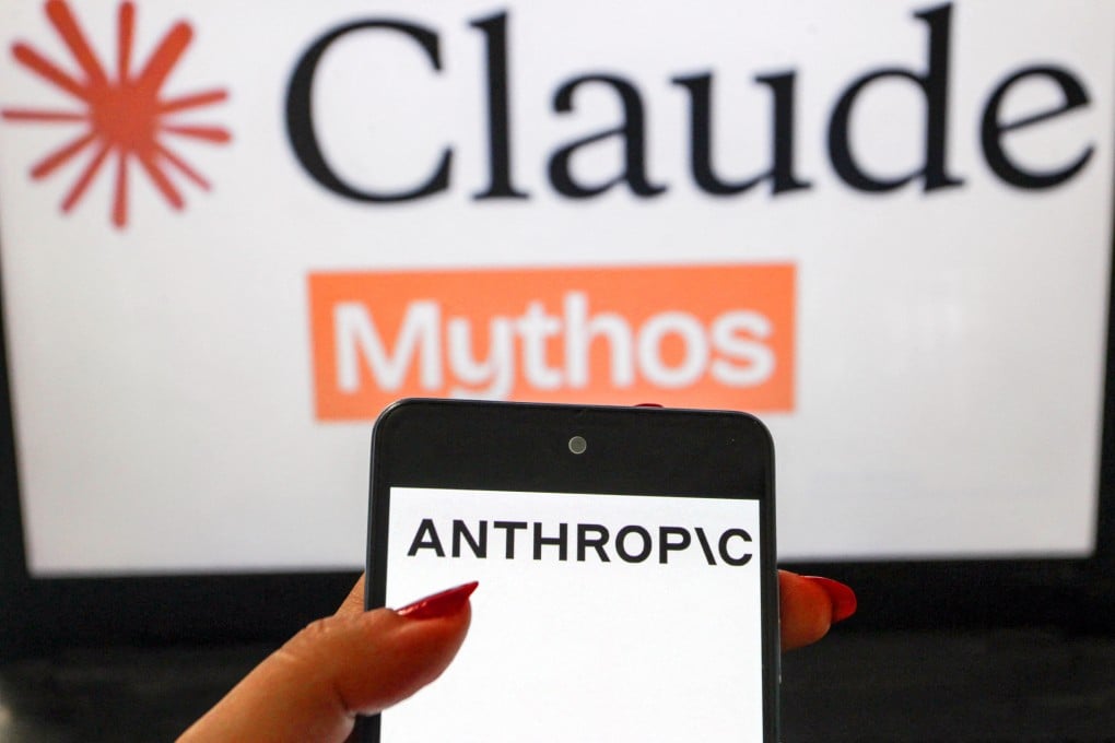 A smartphone showing the Anthropic logo is shown in the foreground with a blurred Claude Mythos themed background in July. Photo: AFP