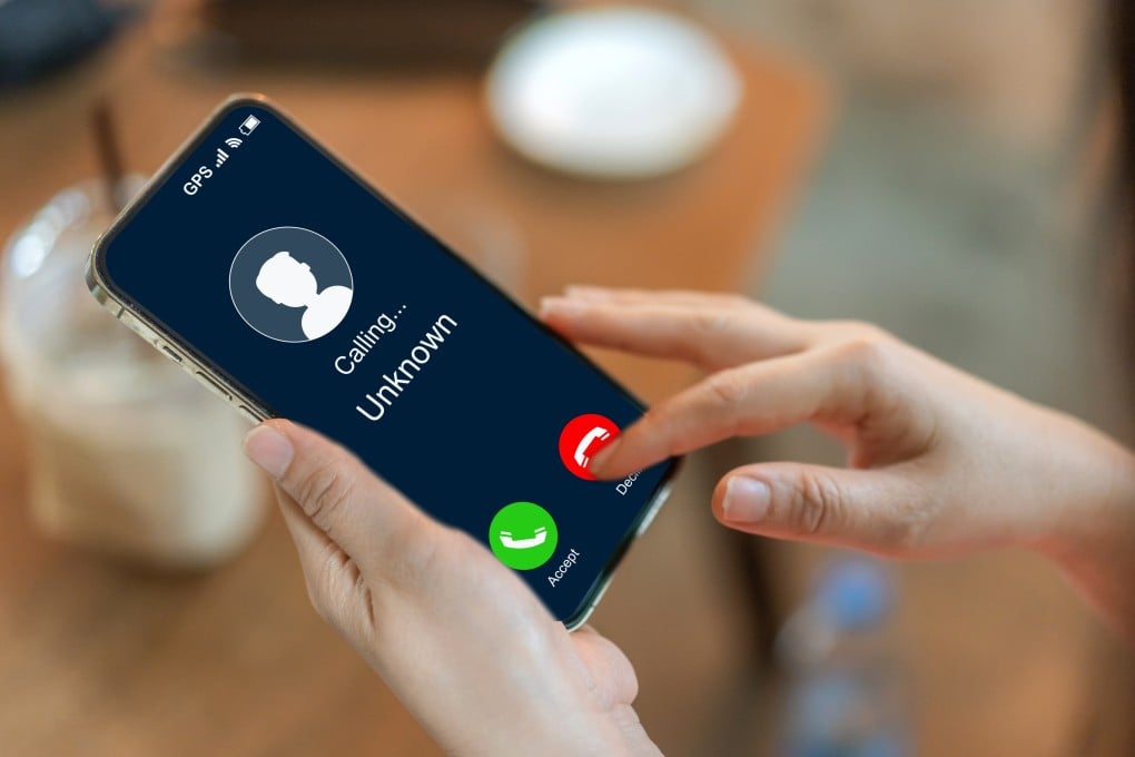 Hong Kong police have arrested a 24-year-old man over an alleged scam operation that made more than 23,000 fraudulent calls in a week. Photo: Getty Images
