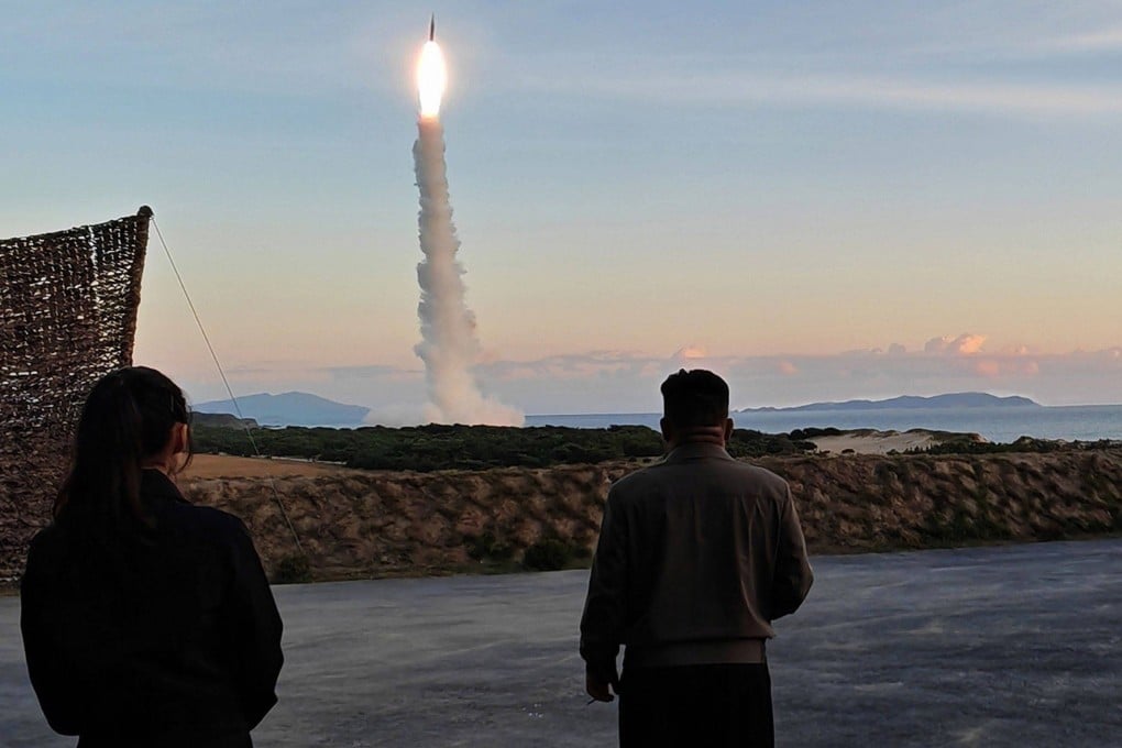 North Korean leader Kim Jong-un and his daughter (left) observe a ballistic missile launch in the country’s eastern region on October 3. Photo: KCNA/KNS/dpa