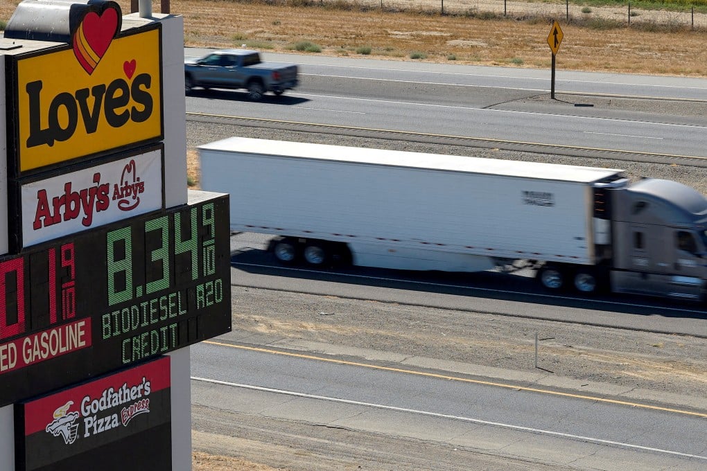A truck drives past a sign advertising gas and diesel prices along Interstate 5 in Williams, California, the United States, on September 28. Photo: Reuters
