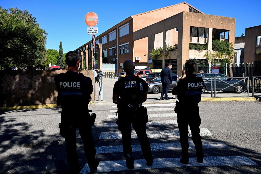 French police officers patrol outside the Joseph-Lakanal middle school in Aubagne, southern France, on Monday after a shooting. Photo: AFP