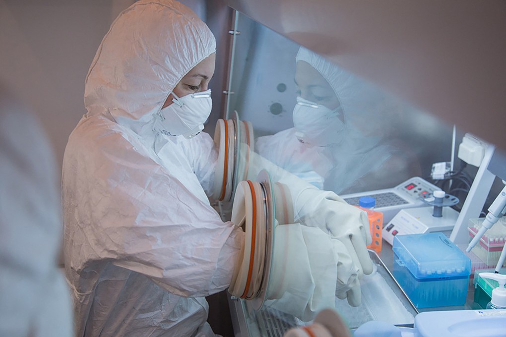 In this undated handout picture released by the Irkutsk Antiplague Research Institute, a specialist works in a laboratory as part of anti-epidemic measures during the 2019 Winter Universiade in Krasnoyarsk. Photo: AFP/Irkutsk Antiplague Research Institute