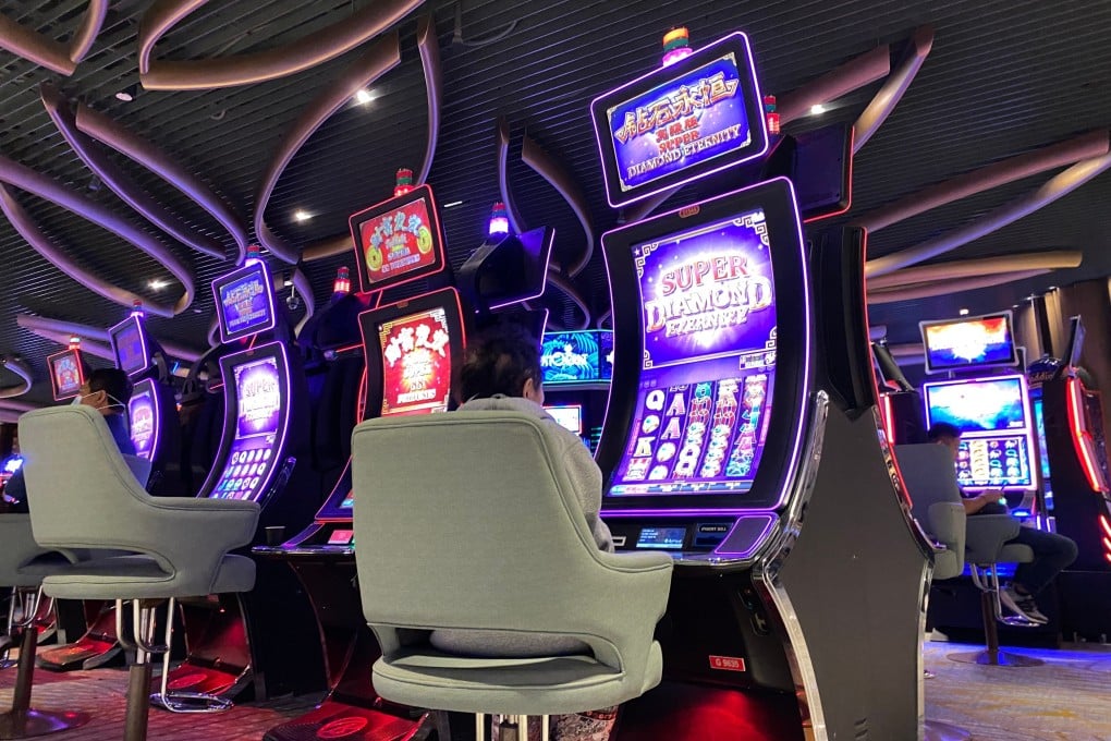 People use slot machines inside a casino at Genting Highlands integrated resort development in Malaysia. Photo: Shutterstock