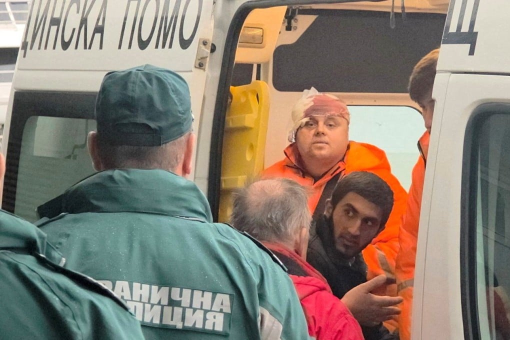 Rescued crew members from a ship that was damaged in a drone attack are taken away in an ambulance in Varna, Bulgaria, on Tuesday. Photo: Reuters