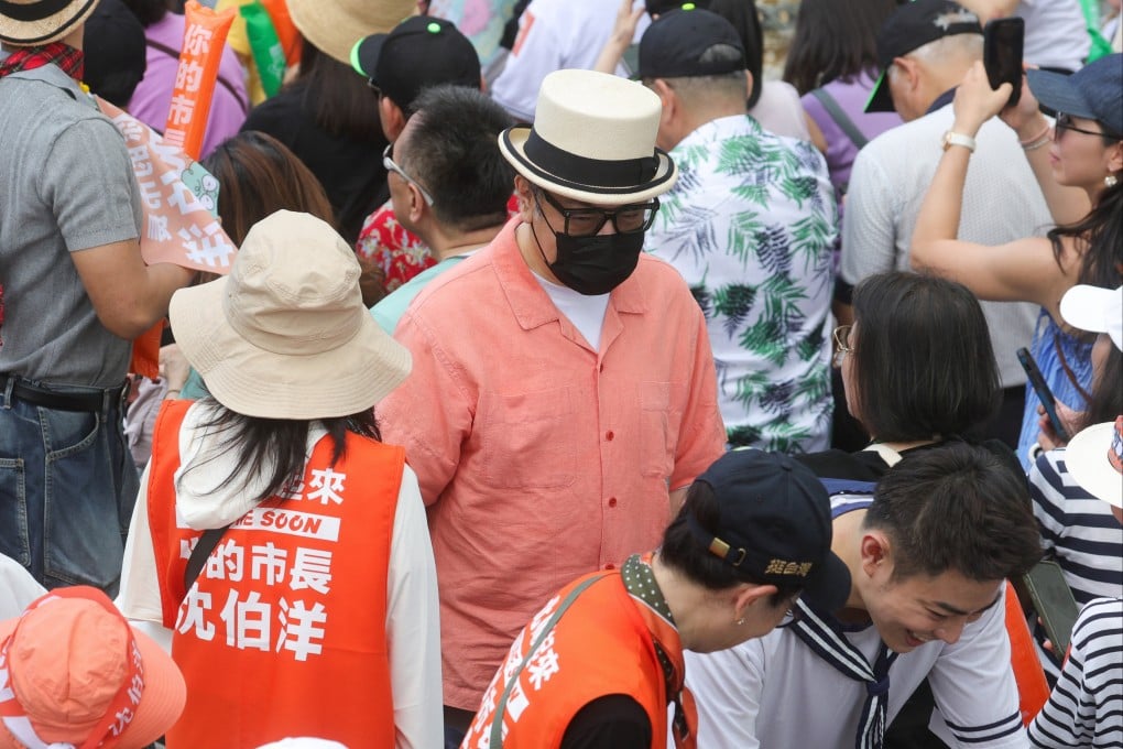 Television personality Kevin Tsai Kang-yong attends a rally for the Democratic Progressive Party's Taipei mayoral candidate Puma Shen Po-yang in Taiwan on October 4. Photo: CNA