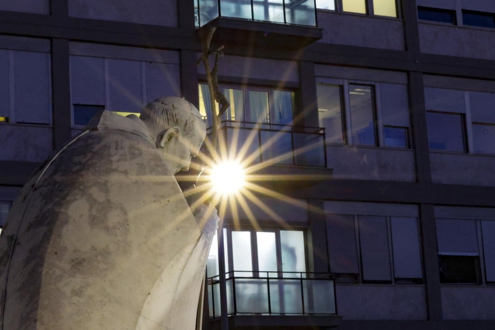 The statue of Pope John Paul II stands outside Agostino Gemelli Hospital in Rome, Italy, on Tuesday. Photo: EPA